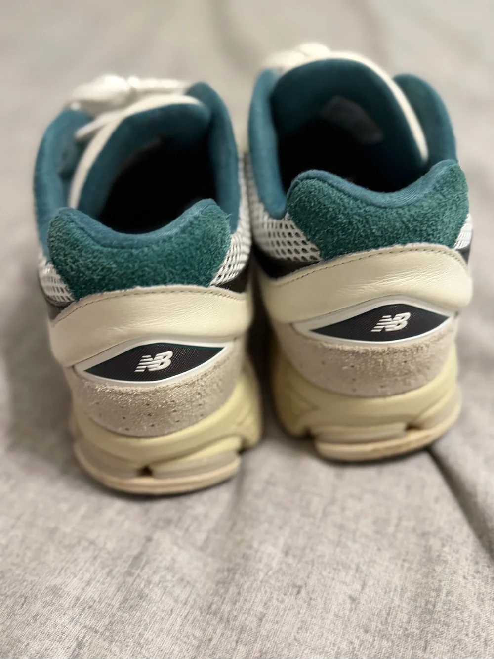 New Balance White Sneakers with Teal Lining and Navy Accents